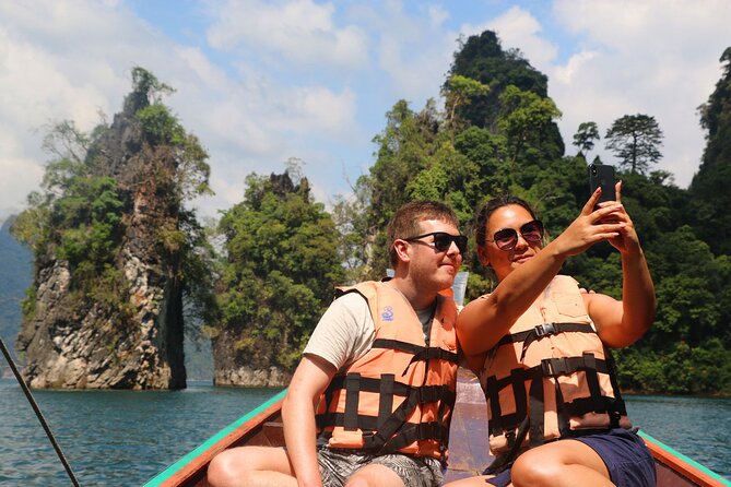 Amazing One Day Trip At Cheow Larn Lake From Khao Lak - Smiley Lakehouse area: emerald-clear water, kayaking, and downtime