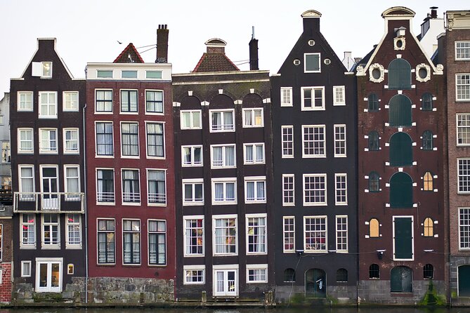Amsterdam Day Trip from Brussels With Cheese, Clogs and Windmills - Windmill Stops Inside the City: De Gooyer as a Photo Pause