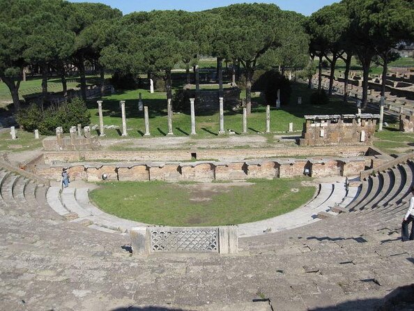 Ancient Ostia Antica Semi-Private Day Trip from Rome by Train with Guide - Finding your bearings at Ostia Antica: Decumanus Maximus first