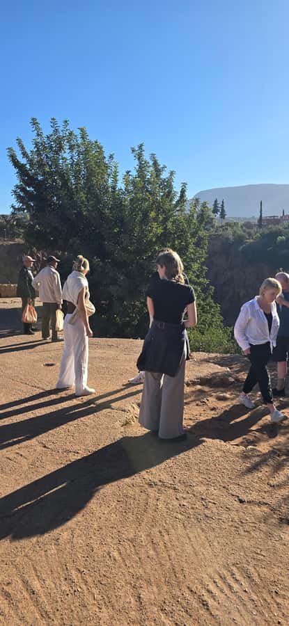 Atlas mountains hike with waterfalls & 3 valleys day trip - Return to Marrakech: Photo Stops and Different Roads