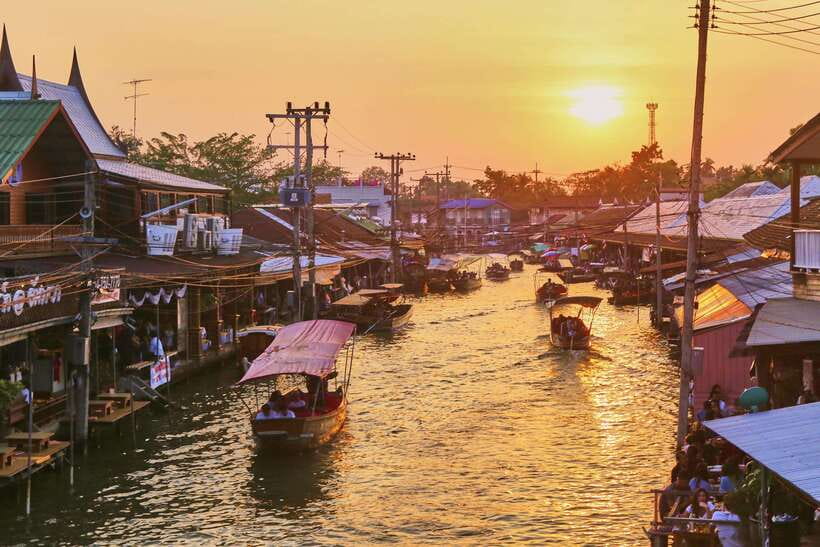 Bangkok: Maeklong Railway & Amphawa Floating Market Day Trip - Wat Bang Kung: Banyan Roots, Shrines, and Soldier Stories