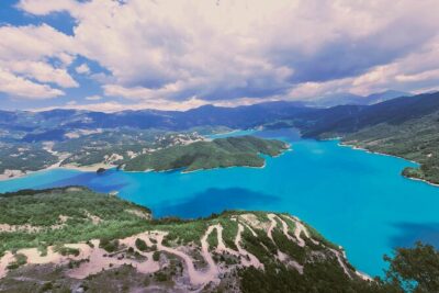 Bovilla Lake And Gamti Mountain Hiking Day Trip From Tirana - Leaving Tirana: the ride sets the tone