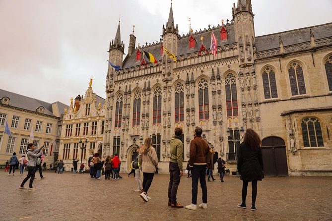Bruges Guided or Audio Trip with Canal Cruise Option from Paris - Markt Time: Chocolate, Fries, Beer, and Getting Your Bearings