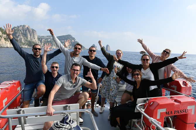 Capri Mini Cruise and City Sightseeing Day Trip from Naples - The boat circuit around Capri: grottos, arches, and the Faraglioni pass
