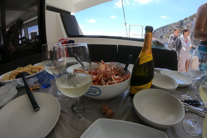 Catamaran Alghero, Catamaran Sailing Day Trip - Aperitif and lunch onboard: the value is in the timing and the local focus