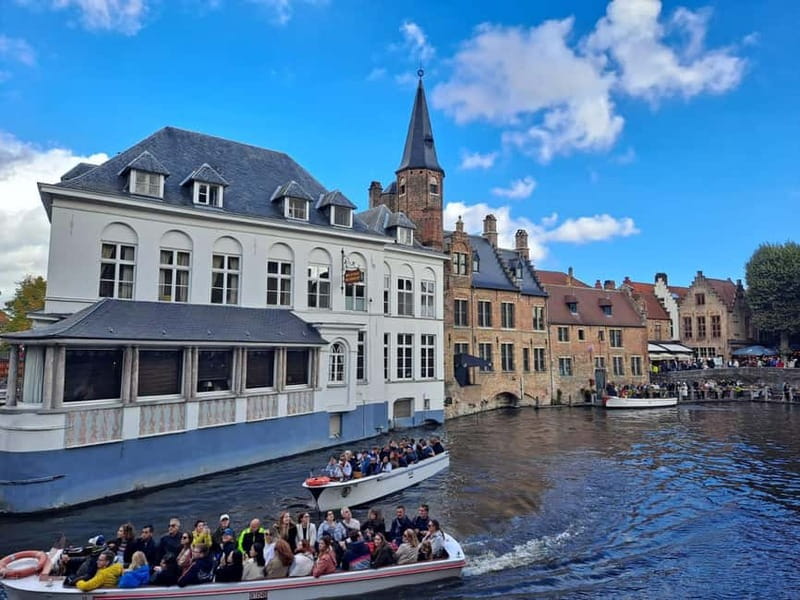 Day trip to Bruges from Paris with canal cruise - Getting There: 8-Person Minivan, Pickup, and Timing