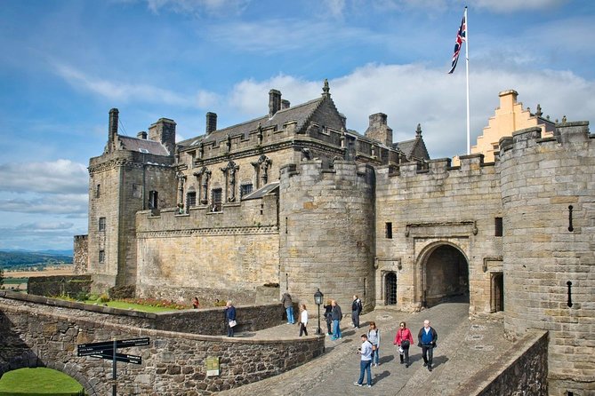 Day Trip to Loch Lomond and Trossachs National Park with Optional Stirling Castle Tour from Edinburgh - Balmaha and Loch Lomond: views, a shore walk, and the weather test