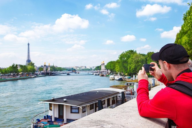 Day Trip to Paris with Eiffel Tower, Notre Dame and Louvre Museum - Photo Paris on the Way: Champs-Élysées and the Arc de Triomphe Area