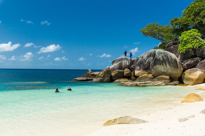 Fitzroy Island Day Tour from Cairns - Beaches and footwear: old coral means reef shoes are not optional