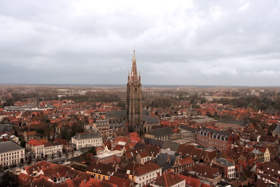 From Amsterdam: Bruges Day Trip in English with Boat Option - Bruges guided walk: Minnewater, Begijnhof, and getting your bearings