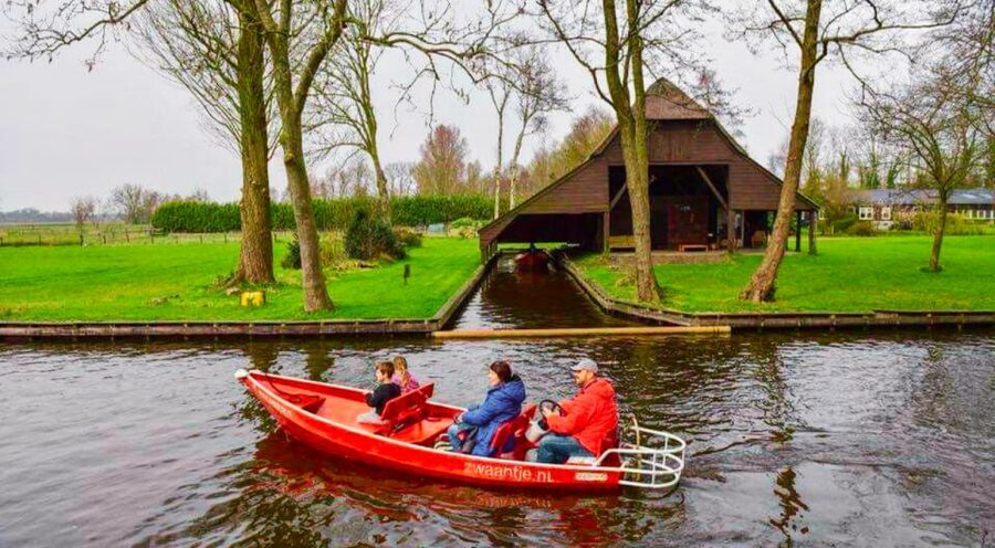 From Amsterdam: Giethoorn Guided Day Trip with Canal Cruise - Giethoorn on foot: thatched roofs, canalside bridges, and village time