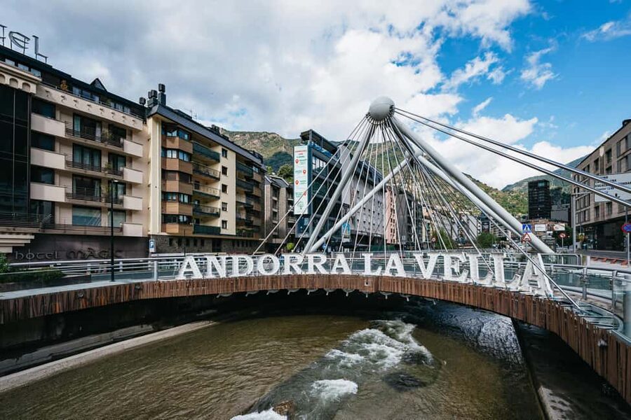 From Barcelona: Guided Day Trip to Andorra, France and Spain - Andorra la Vella’s Guided Anchors: Church, Parliament, and the Dali Watch