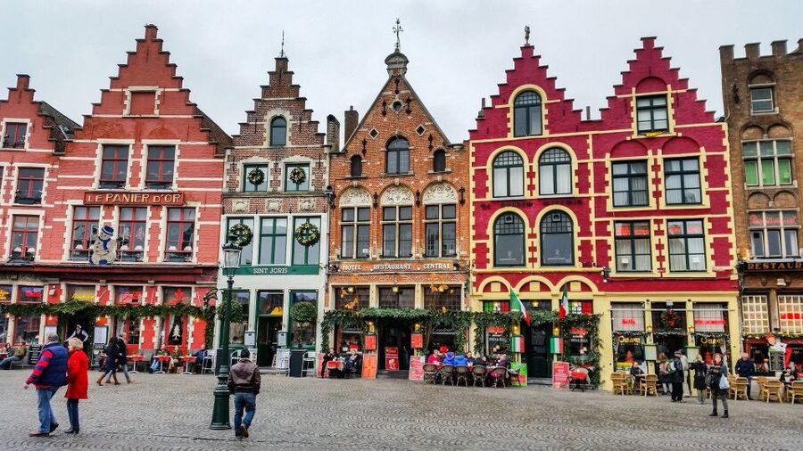 From Brussels: Bruges and Ghent Full-Day Trip by Train - Bruges canal life: walking the UNESCO core without getting lost