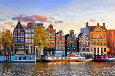 From Brussels: Day Trip to Amsterdam with Canal Boat Cruise - Arrival in Amsterdam: Guided Stops Before You Hit the Canals