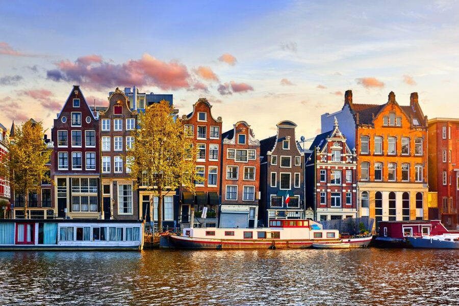 From Brussels: Day Trip to Amsterdam with Canal Boat Cruise - Arrival in Amsterdam: Guided Stops Before You Hit the Canals