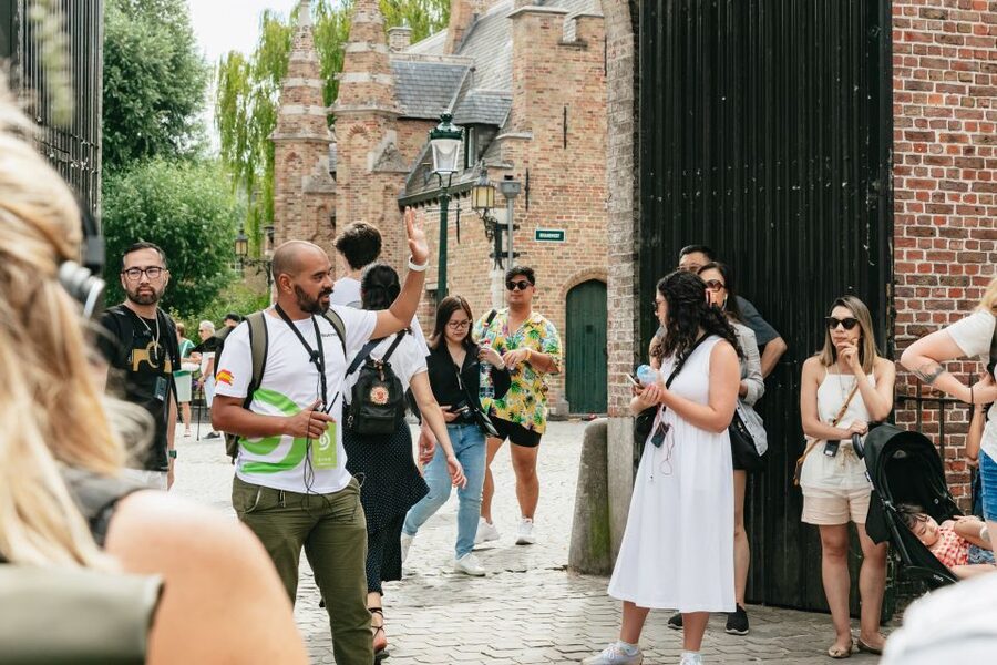 From Brussels: Guided Day Trip to Bruges and Ghent - St. Nicholas, the Masons’ Guild House, and the medieval port of Graslei