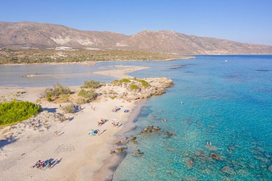 From Chania: Elafonisi Pink Sand Beach Day Trip w/ Elos Stop - Elafonisi pink sand and turquoise lagoons: what the beach experience feels like