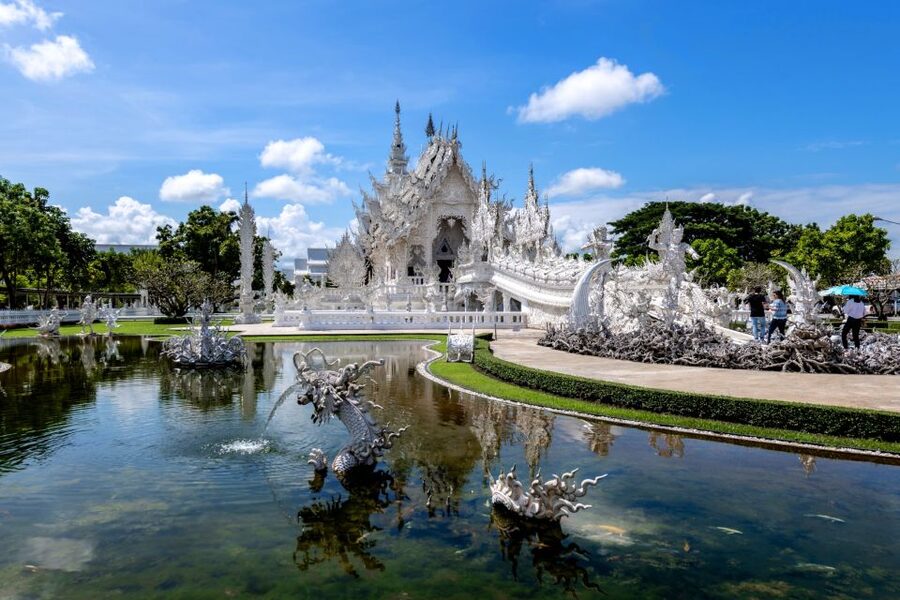 From Chiang Mai: Chiang Rai's Temples Exploration Day Trip - Lunch in Chiang Rai: included Thai buffet, with practical variety