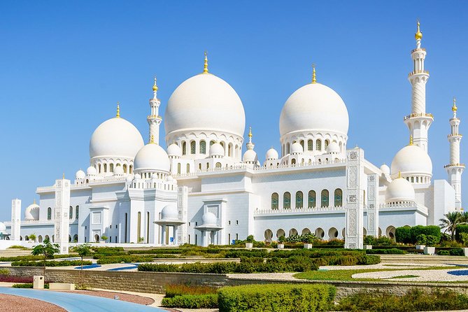 From Dubai: Abu Dhabi Full-Day Trip with Louvre & Grand Mosque - The quick photo stops: Emirates Palace, Etihad Towers, and the Corniche