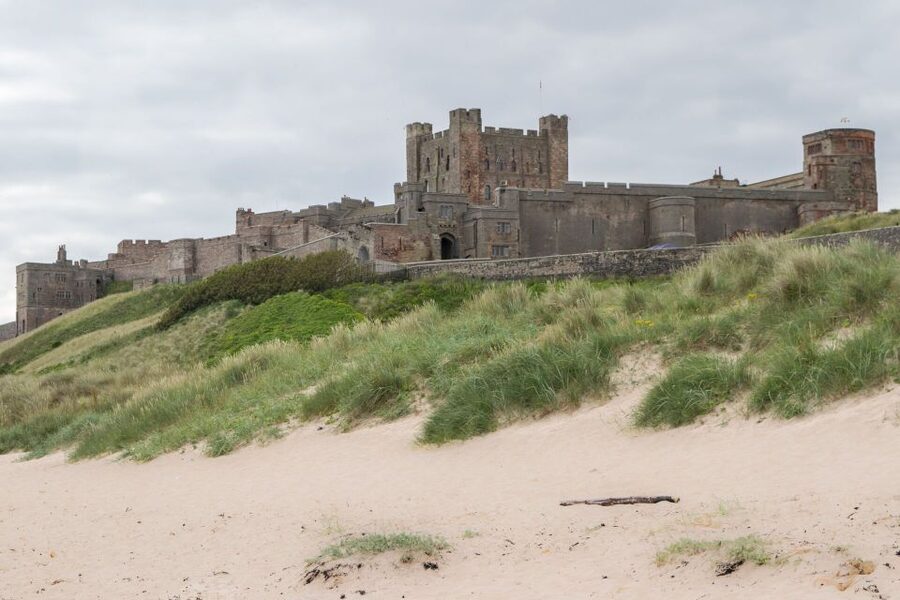 From Edinburgh: Day Trip to Bamburgh and Alnwick Castle - Alnwick Castle: Hogwarts vibes, a real family home, and serious medieval drama