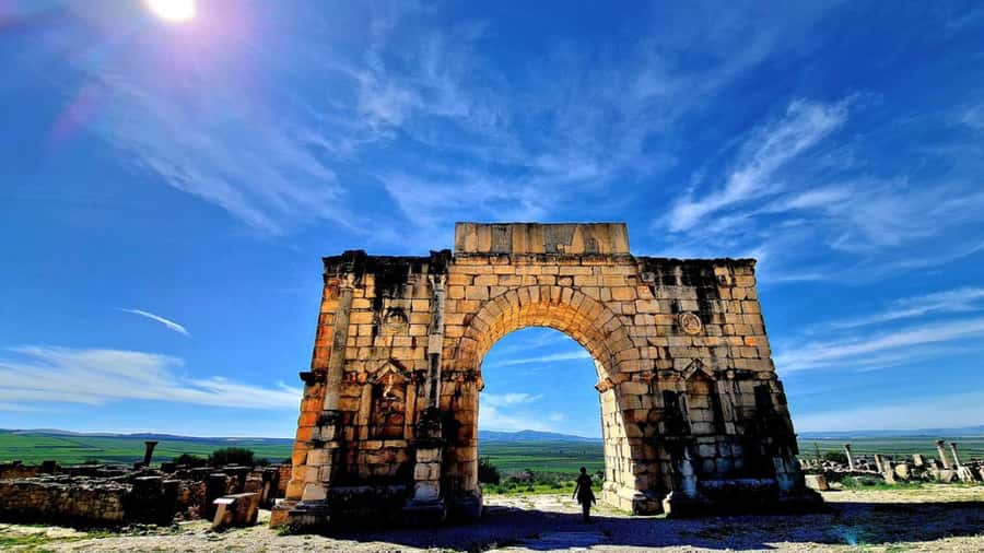 From Fes: Meknes Volubilis and Moulay Idriss Day Trip - Moulay Idriss: holy town streets, a mosque-area stop, and a photo viewpoint