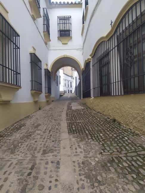 From Fuengirola: Ronda+Setenil de las Bodegas Day Trip - Bullring area and Old Town streets: what you see beyond the postcard