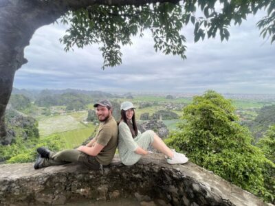 From Hanoi: Hoa Lu, Mua Cave and Tam Coc Full-Day Trip - Climbing Mua Caves for Tam Coc Panoramas (and Dealing With Rain)