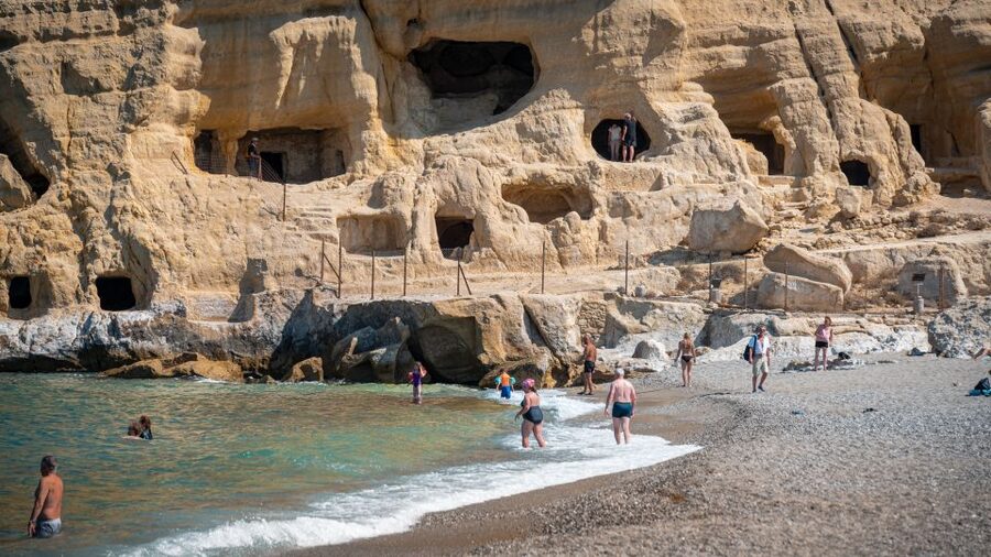 From Heraklion: Day Trip to Matala Hippie Beach and Caves - Matala: where Zeus, hippies, and caves share the same shoreline