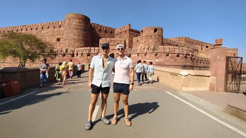 From Jaipur: Private Taj Mahal & Agra Day Trip with 5<em> Lunch – Taj Mahal with fast-track entry: how to use the 3 hours’ /><br />
The Taj Mahal is the headline, and the fast-track entry is the reason this kind of trip saves time. You’ll arrive, meet your licensed local guide, and then get a guided walk through the marble beauty with stories that explain what you’re looking at—not just where to stand.</p>
<p><p>You’re given up to <strong>three hours</strong> at the Taj Mahal. That’s enough time to do two smart things:</p>
</p>
<ul>
<li>Get your “wow” photos early, before you’re tired and people are blocking your angles.</li>
<li>Slow down for details on the artwork and layout, where the guide’s explanations actually change how you see the building.</li>
</ul>
<p><p>A good guide also helps you navigate the photo chaos. Several guides listed for this experience (like Anshu, Arif, Imran Ali Khan, Mehfooz, and Ankur Sharma among others) are repeatedly credited for timing and photo spot guidance. If you care about pictures, ask your guide to show you a couple of distinct angles—near the main viewpoints and then a secondary spot where the crowd pressure is different.</p>
</p>
<p><p>Important date note: the Taj Mahal closes every <strong>Friday</strong>. If you’re booking around that, confirm your day is open before you lock in plans.</p>
</p>
<h2 id="agra-fort-history-that-you-can-walk-and-see">Agra Fort: history that you can walk and see</h2>
<p> Lunch – Agra Fort: history that you can walk and see’ /><br />
After the Taj, you head to Agra Fort, another UNESCO landmark tied to the Mughal world. Here, the tour shifts from pure monument admiration to “how did this place work?” energy. Your guide takes you through the fort grounds with context on the architecture and its role in power and defense.</p>
<p><p>You’ll get about <strong>one hour</strong> at Agra Fort. That’s a good amount for a guided visit because it keeps you moving through the key areas without turning it into a slow slog. The fort can feel big, and the value of a guide is that you’re not guessing which points actually matter.</p>
</p>
<p><p>Drawback to consider: one hour is not long enough for deep wandering. If you love forts and could spend half a day climbing and reading every sign, you might feel a little rushed. But if your goal is a strong highlights circuit, the timing is pretty effective.</p>
</p>
<p><p>Also keep your expectations realistic about the experience: the fort is outdoors and can feel warm. Sunglasses are specifically recommended, and your umbrellas can be handy if clouds move in.</p>
</p>
<h2 id="baby-taj-the-quieter-stop-that-adds-depth">Baby Taj: the quieter stop that adds depth</h2>
<p><img width="689" height="650" decoding="async" src=