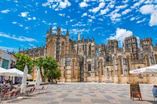 From Lisbon: Fatima Batalha Nazare & Obidos Small Group Day Trip - Óbidos village: fortified walls, cobblestones, and a castle mood