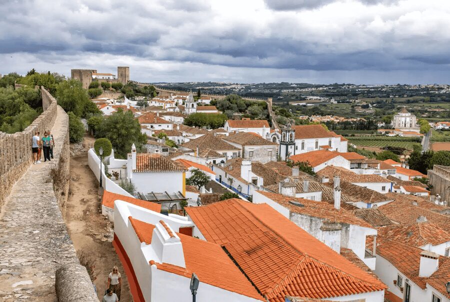 From Lisbon: Nazare Big Waves and Óbidos Guide Day Trip - Waterfront time: where the fishing culture shows up fast