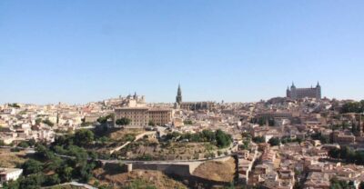 From Madrid: Day Trip to Toledo with Local Guide - Getting to Toledo: meeting in Madrid and the bus ride with wall views