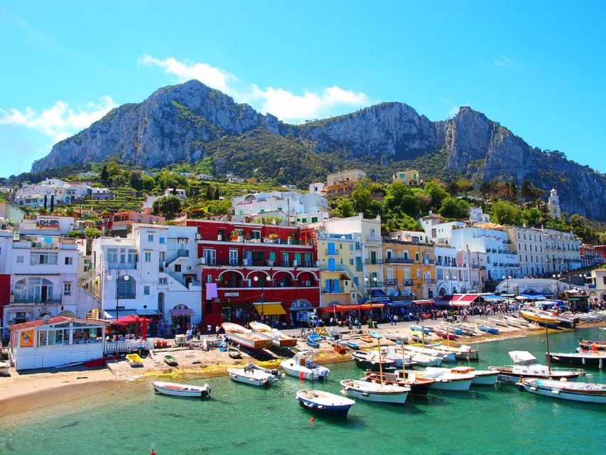 From Naples: Capri Boat Day Trip with Drinks - The Boat Ride to Capri: Snacks, Drinks, and Coastline Views