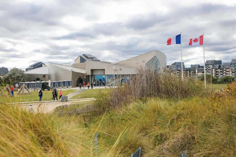 From Paris: Normandy D-Day Beaches Day Trip - Optional Juno Beach and a WWII museum add another lens