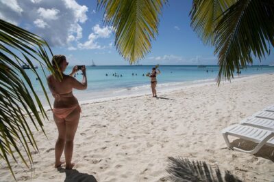 From Punta Cana: Saona Island & Altos de Chavon Day Trip with Lunch and Open Bar - The boat ride to Saona: catamaran comfort with party-boat energy