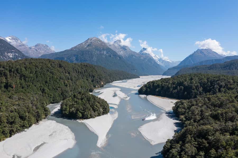 From Queenstown: Dart River Canoe & Jet Boat Day Trip - Paradise Valley back-country bus: movie vibes with real driving