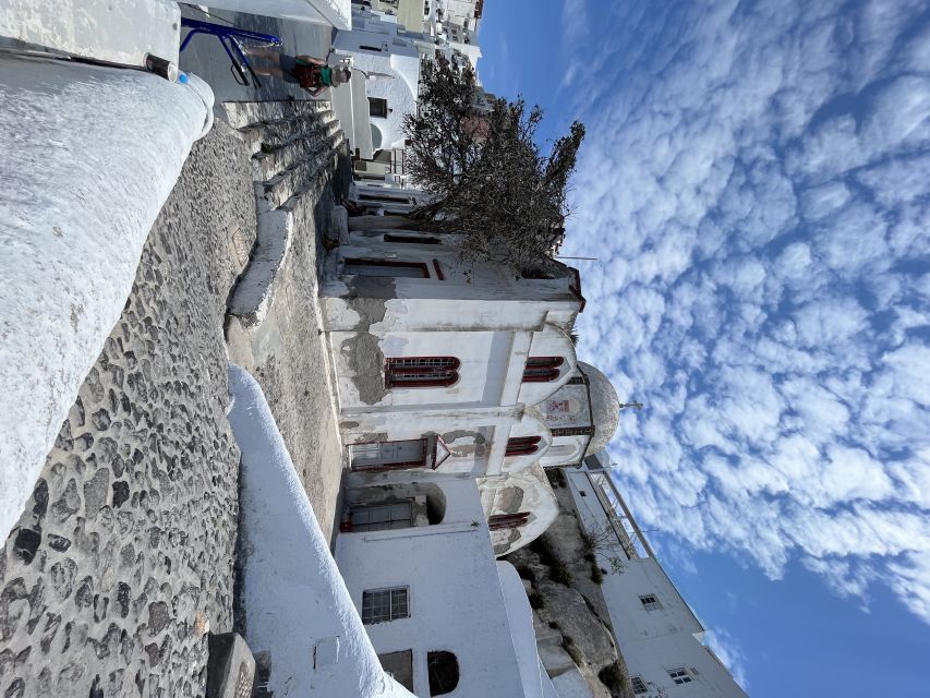 From Rethymno: Full-Day Trip to Santorini by Boat - Optional caldera boat ride: the €20 add-on decision