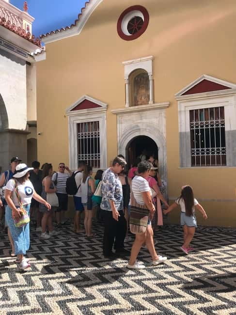 From Rhodes: Symi Island and Panormitis Monastery Day Trip - Symi’s 3.5-hour free time: harbor colors, sponge shops, and backstreet wandering