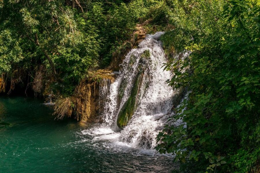From Zadar: Krka National Park and Waterfalls Day Trip - Šibenik vs Skradin: your town stop depends on the season