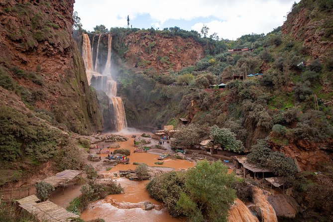 Full Day Trip To Ouzoud Waterfalls From Marrakech & Boat Tour - Hand-powered barge, river cafes, and that riverside rhythm