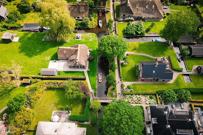 Giethoorn and Afsluitdijk Day Trip from Amsterdam with Boat Trip - Afsluitdijk Photo Stop: Flood Control That You Can Actually See