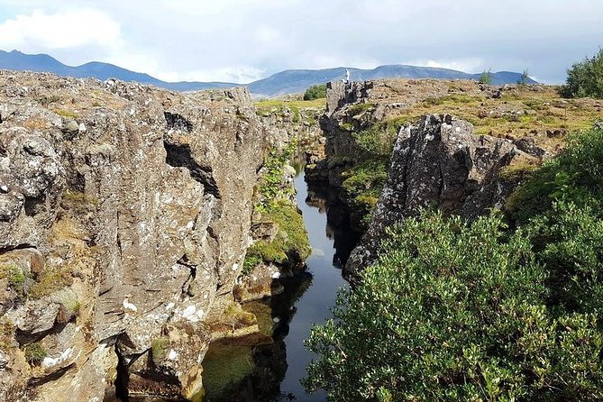 Golden Circle. Private Day Tour from Reykjavik - Gullfoss waterfall: two tiers, one deep canyon, and the glacial connection