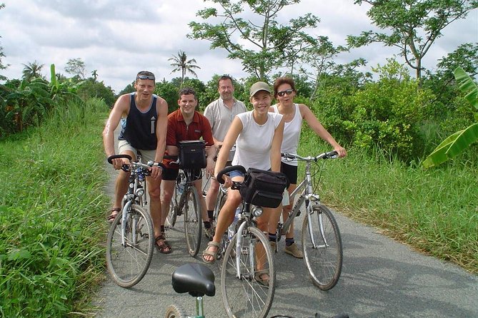 HCM:Mekong Delta Boat,Khotcake cooking Coconut Village,SmallGroup - Vinh Trang Pagoda: the calm, historic reset you want mid-day