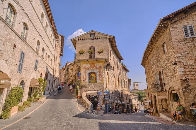 Heart of Italy Day Trip: Visit Perugia and Assisi from Florence - First stop feel: the 7:30am start and your coach setup