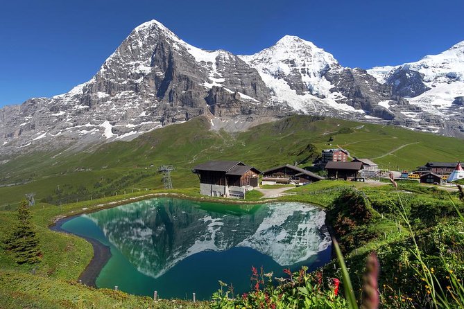 Jungfraujoch Day Trip from Lucerne with Eiger Express Gondola - Ice Palace tunnels: cold, bright, and surprisingly memorable