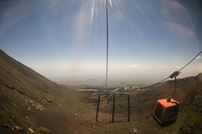 Mount Etna Day Trip from Taormina - What the day feels like at altitude: wind, cold, toilets, and queues