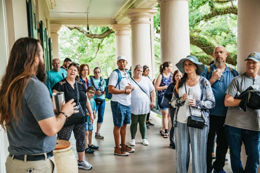 New Orleans: Oak Alley Plantation and Swamp Cruise Day Trip - Swamp cruise on a covered boat: wildlife spotting and bayou storytelling