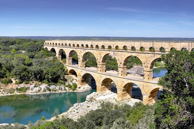 Nimes, Uzes & Pont du Gard Small Group FULL DAY Tour from Avignon - The Medieval Garden in Uzès: Herbs, a Tower, and a View Worth Climbing