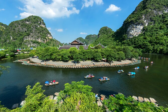 Ninh Binh Day Trip: Hoa Lu-Trang An/Tam Coc-Mua Cave-Cycling-Boat - Trang An Grottoes Boat Ride: Caves, Stalactites, and That Bamboo Boat Pace