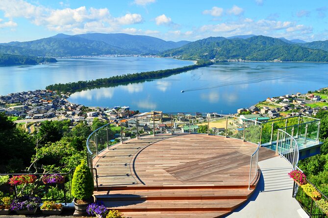 Osaka Day Tour: Amanohashidate & Ine Bay - Ine Bay sightseeing boat: funaya from the water, sea birds, and a dolphin maybe